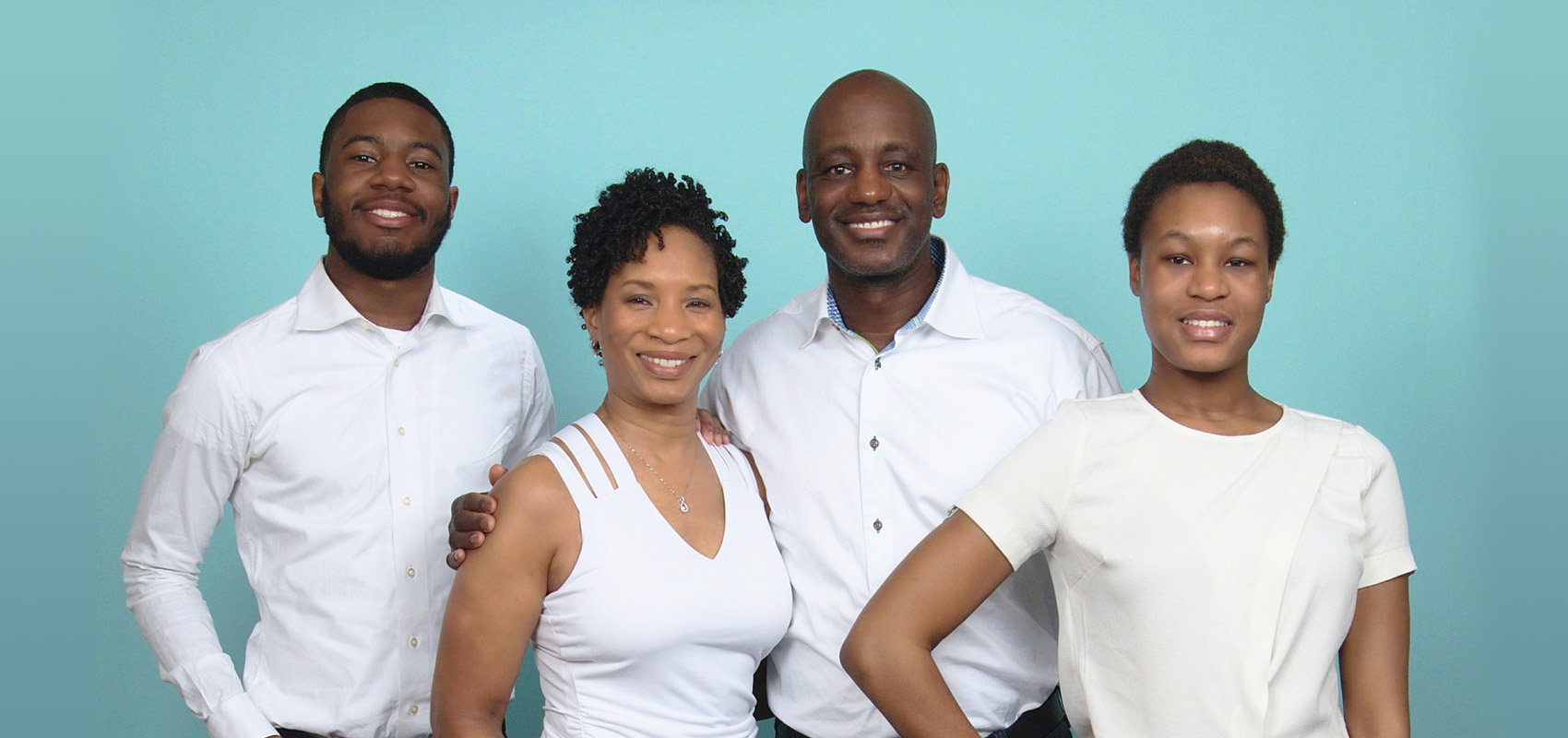 The DeVese Family in white shirts - Cynthia, her husband, daughter, and son